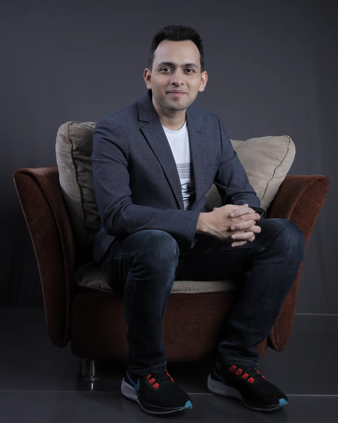 Sagar Sangam Sahu sitting in an armchair